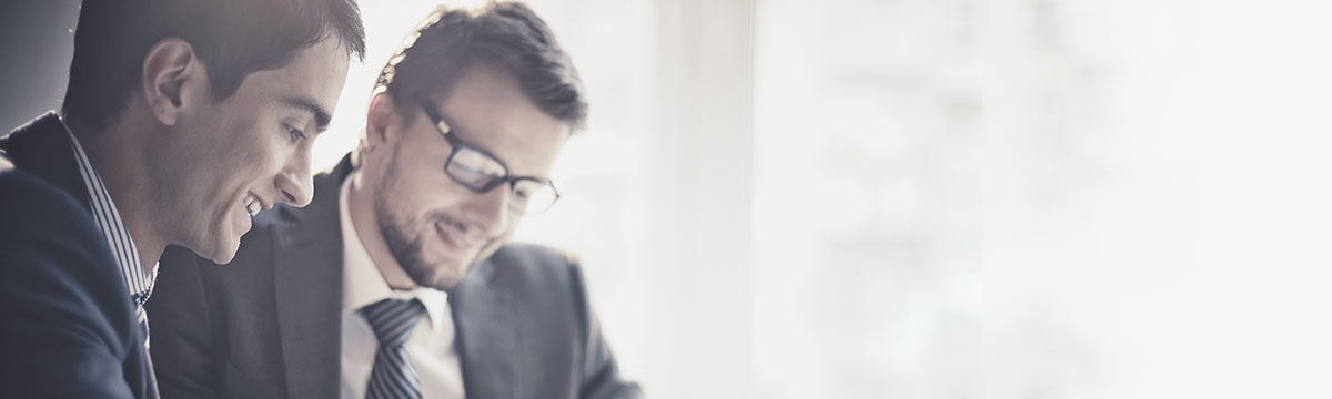 Corporate and Investment Banking Image of two men.