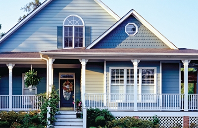 Photo of a blue house with porch