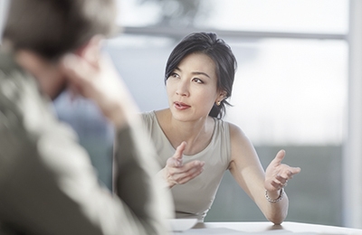 Woman speaking in Meeting