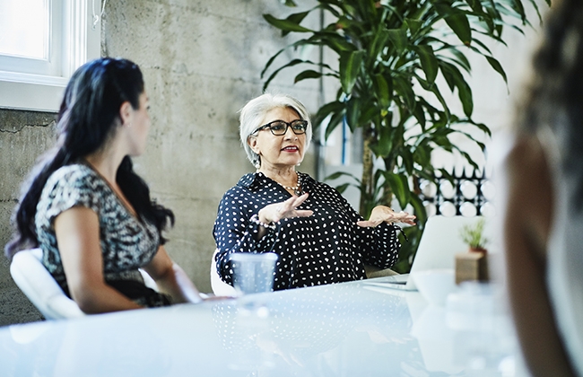 Two woman meeting and talking