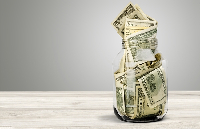Jar filled with cash
