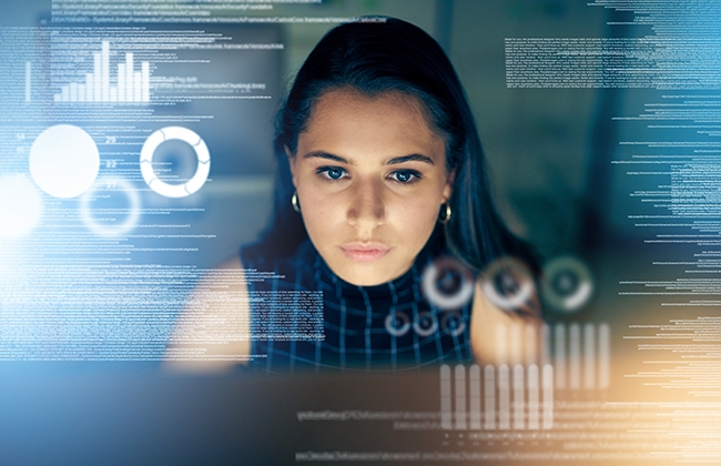 Cybersecurity expert in front of a screen