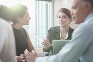 Four people having a discussion