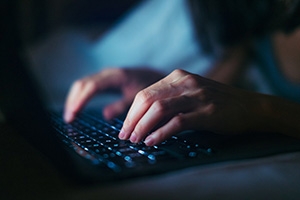 Hands on cybersecurity keyboard