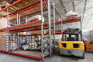 Forklift stocking warehouse